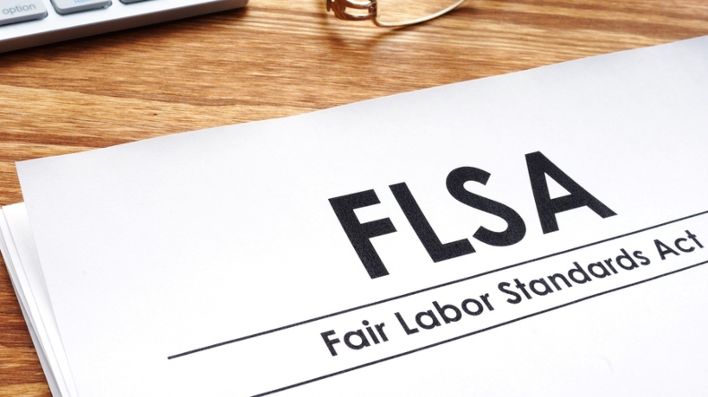 Fair labor standards act FLSA on a desk.