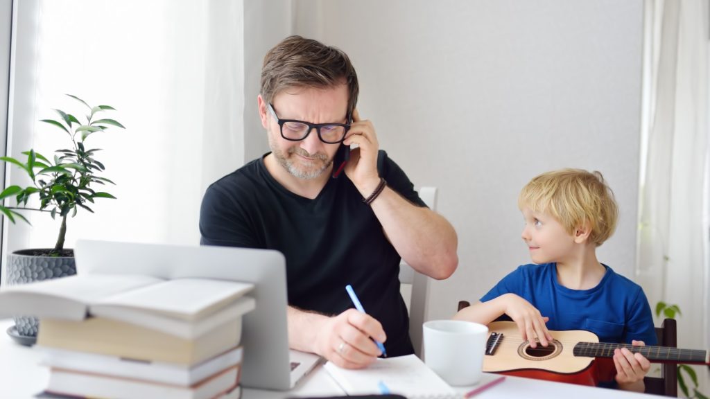 parent working from home with child