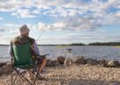 retired man fishing at lake
