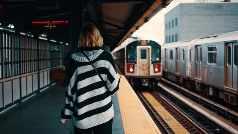 woman taking train