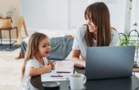 working mom with daughter